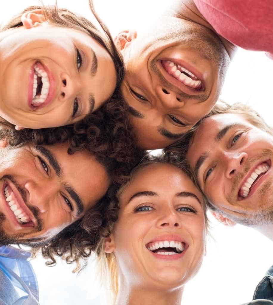 Smiling person showcasing white teeth after laser whitening treatment Kingston upon Hull